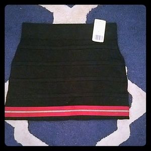 Black mini shirt with red zipper